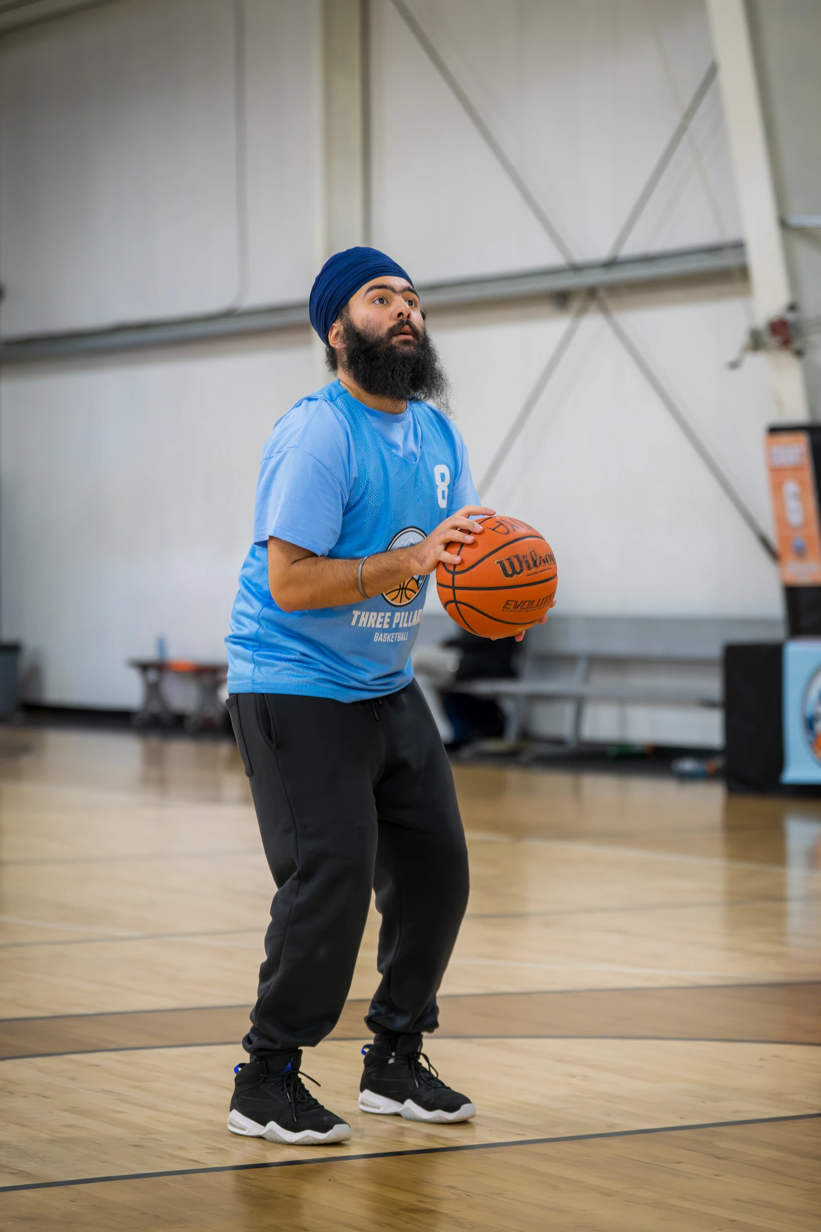 Singh shooting a free throw under pressure at 3PB tournament